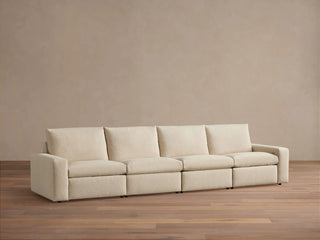Kipton Wide Arm Four-Piece Motion Modular Sofa