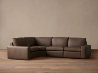 Kipton Wide Arm Leather Four-Piece Motion Sectional