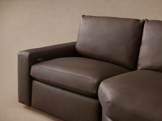 Kipton Wide Arm Leather Four-Piece Motion Sectional