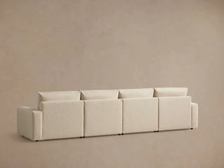 Kipton Wide Arm Four-Piece Motion Modular Sofa