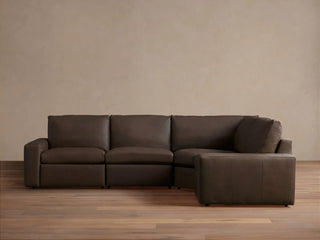 Kipton Wide Arm Leather Four-Piece Motion Sectional