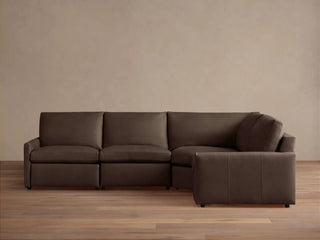 Kipton Slim Arm Leather Four-Piece Motion Sectional