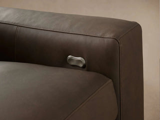 Kipton Wide Arm Leather Four-Piece Motion Sectional