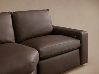 Kipton Wide Arm Leather Four-Piece Motion Sectional