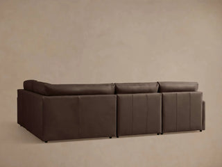 Kipton Slim Arm Leather Four-Piece Motion Sectional