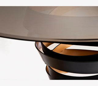 Intuition Round Glass Dining Table – Swirling Metal Ribbon Base
